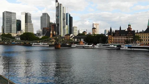 Flight by copter over skyscrapers and river, bridge in Framfurt Video stock 129376118