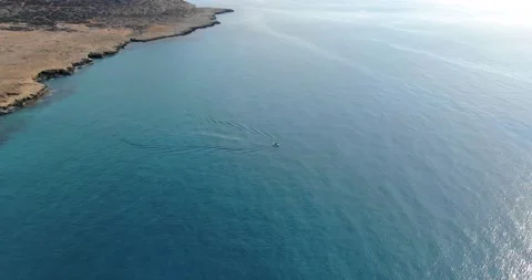 The flight of a copter over the steep shore of the island Stock Footage 237246257