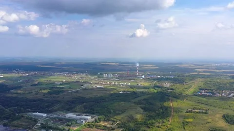 Flight from a copter. Technological factories and nature. Stock Footage 139710349