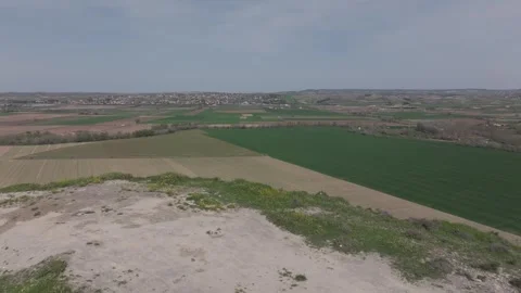 Flight in crop fields and agricultural ruins Stock-Footage 277726454