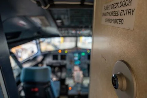 Flight deck door unauthorized entry prohibited. Stock Photos