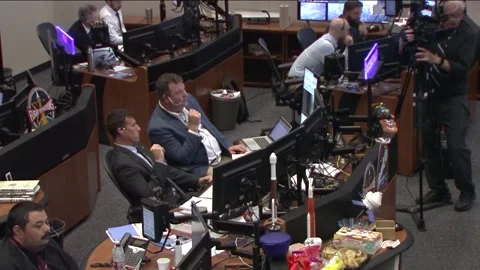 Flight Directors at Johnson Space Center overseeing Starliner's re-entry Stock Footage 284327341