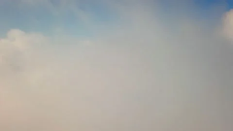 Flight of the drone in the clouds with a view of mount Elbrus - the highest Stock Footage 151771108