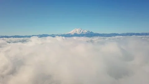 Flight of the drone in the clouds with a view of mount Elbrus - the highest Stock Footage 151771274
