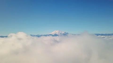 Flight of the drone in the clouds with a view of mount Elbrus - the highest Stock Footage 151771418