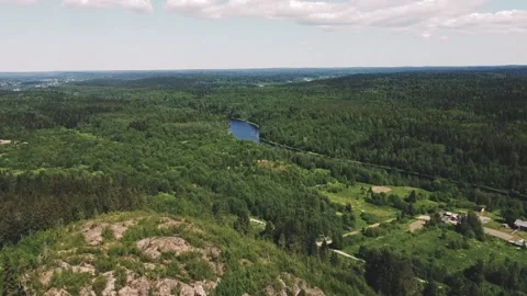 Flight of the drone forward over the mountain towards  forest and river Vidéo 161824562