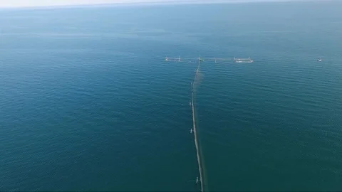 Flight with the drone over the blue sea and yacht port Stock Footage 106680415