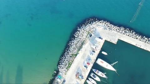 Flight with the drone over the blue sea and yacht port 動画素材 106680970