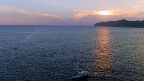 Flight of the drone over the boat. Sunset. Stock Footage 159970566