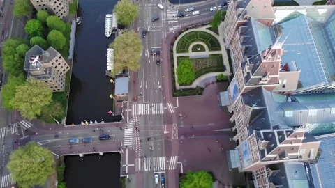 Flight of a drone over canals and the historic center of Amsterdam Stock Footage 144832128