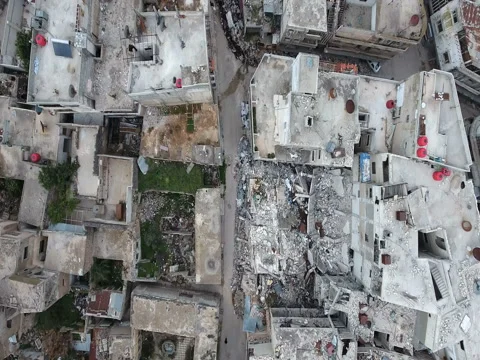 A flight of a drone over the city of homs in Syria Stock Footage