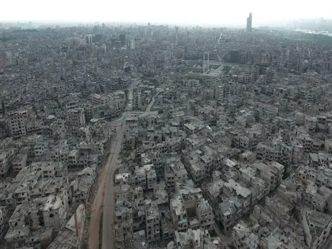 A flight of a drone over the city of homs in Syria Stock Footage