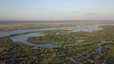 Flight of the drone over the fields and rivers 動画素材 76999922