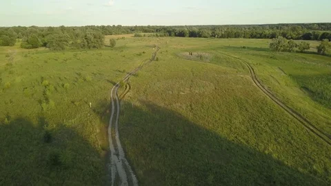 Flight of the drone over the fields and rivers 動画素材 77000048