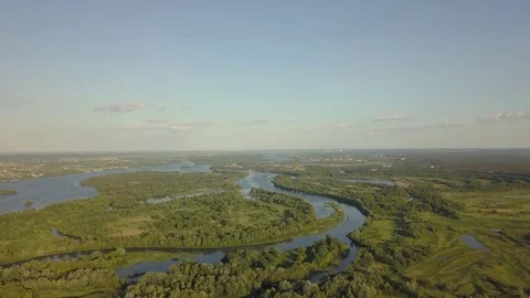 Flight of the drone over the fields and rivers 動画素材 77000063