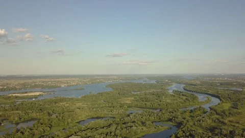 Flight of the drone over the fields and rivers 動画素材 77000079
