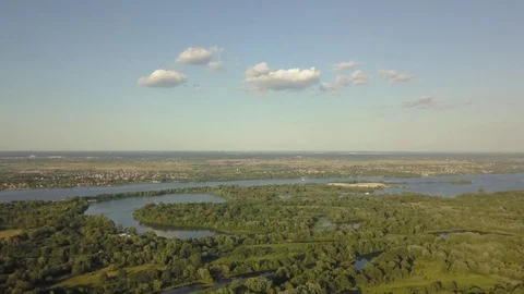 Flight of the drone over the fields and rivers 動画素材 77000087