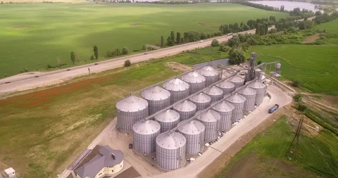 Flight on the drone over the grain drying plant. 스톡 동영상 101645924