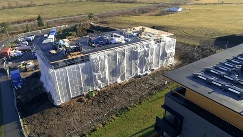 Flight of a drone, over the home construction Stock Footage 86523476