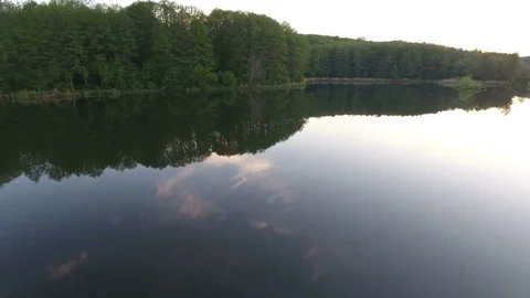 The flight of the drone over the lake Stock Footage 75663359