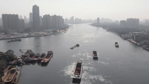 Flight of a drone over a navigable river in a big city Stock Footage 118212754