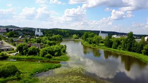 Flight drone over the picturesque river Stock Footage 77604676