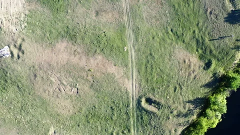 Flight with a drone over sandy roads in the Deliblato desert Stock Footage 133546270