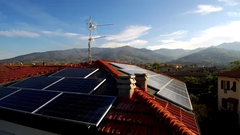 Flight drone over solar panels on the roof of the house 4K Stock Footage 80694902