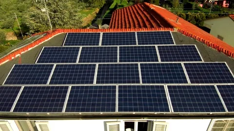 Flight drone over solar panels on the roof of the house 4K 스톡 동영상 80921034