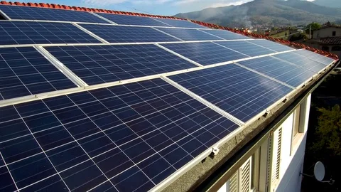 Flight drone over solar panels on the roof of the house 4K Stock Footage 80943047