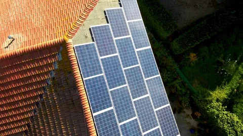 Flight drone over solar panels on the roof of the house 4K 스톡 동영상 80943384