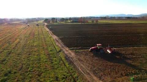Flight drone over view plowed field tractor in the middle of Tuscany Italy 스톡 동영상 234132168