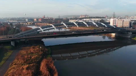Flight of drone over Vistula River , view of bridge with moving vehicles. Stock Footage 147926761