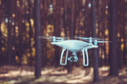 In-flight drone quadrocopter with digital camera Stock Photos