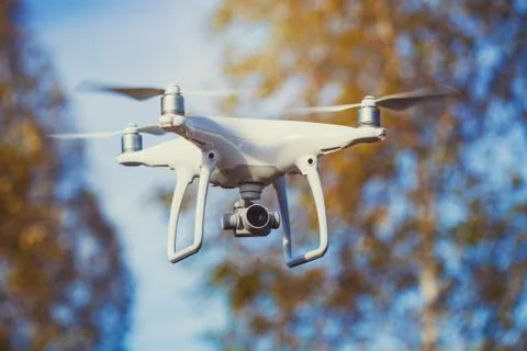 In-flight drone quadrocopter with digital camera Stock Photos