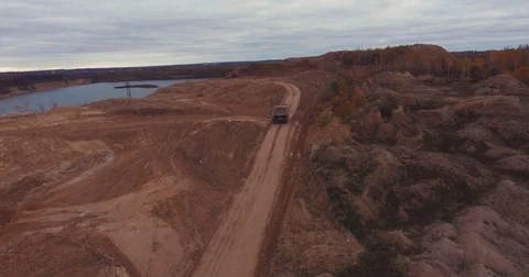 Flight to drone on sand quarry with heavy machinery Video stock 71281693