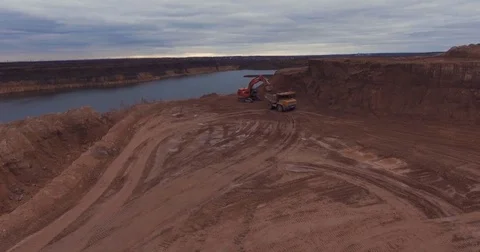 Flight to drone on sand quarry with heavy machinery Video stock 71281771
