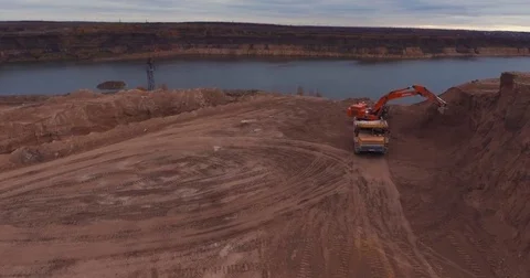Flight to drone on sand quarry with heavy machinery Video stock 71282103