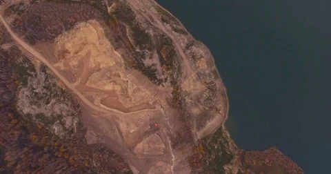 Flight to drone on sand quarry with heavy machinery Video stock 71282794