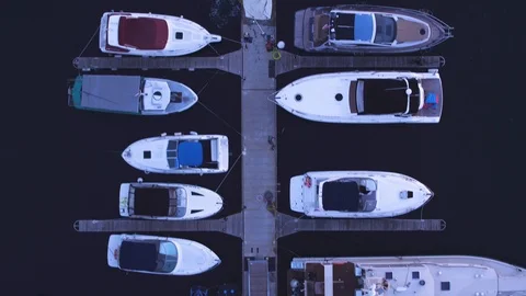 Flight of the drone in the summer evening over yachts, sailboats. Top view Stock Footage 104927409