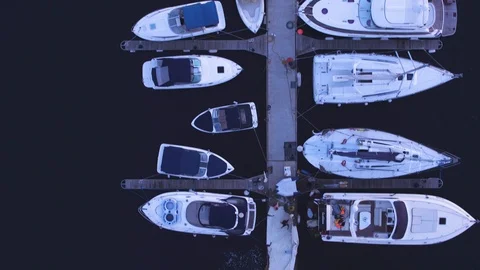 Flight drone summer evening over yachts, sailboats. Top view, motion in the Stock Footage 104928079