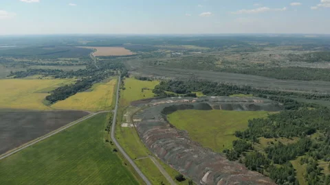 The flight of a drone in the summer over the territory of mining. Stock Footage 165099429