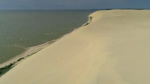 Flight with eagles over sand dunes Russia Curonian Spit natural landscape Sea Video stock 127481574