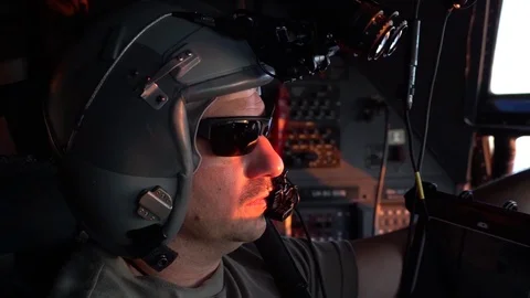 Flight enigneer with computer onboard C-130 Hercules 库存影片 98342395