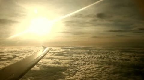 Flight In the Evening With Sunset over clouds Stock Footage 10876077