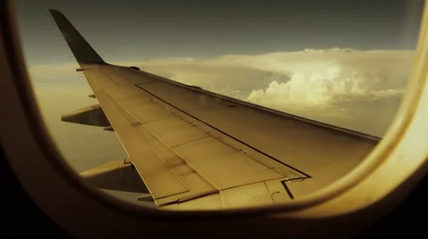 Flight flying. airborne. window view. wing. air traveling. trip tour Stock Footage 40670853