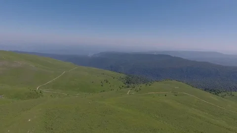 Flight footage over alpine meadows in the highlands Stock Footage 110851736