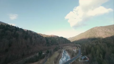 Flight FPV drone over a mountain river in the Korpatski mountains Stock Footage 167428846