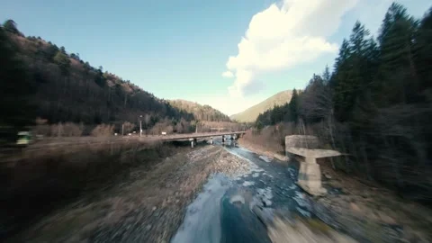 Flight FPV drone over a mountain river in the Korpatski mountains Stock Footage 167428899