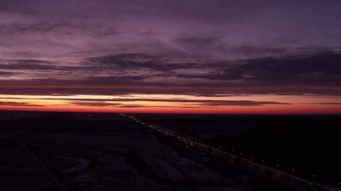 Flight in front of cloudy sunrise Видео 123768156